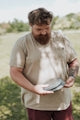 a man holding a frisbee