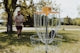 a person standing next to a goal