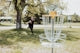 a person jumping over a chair